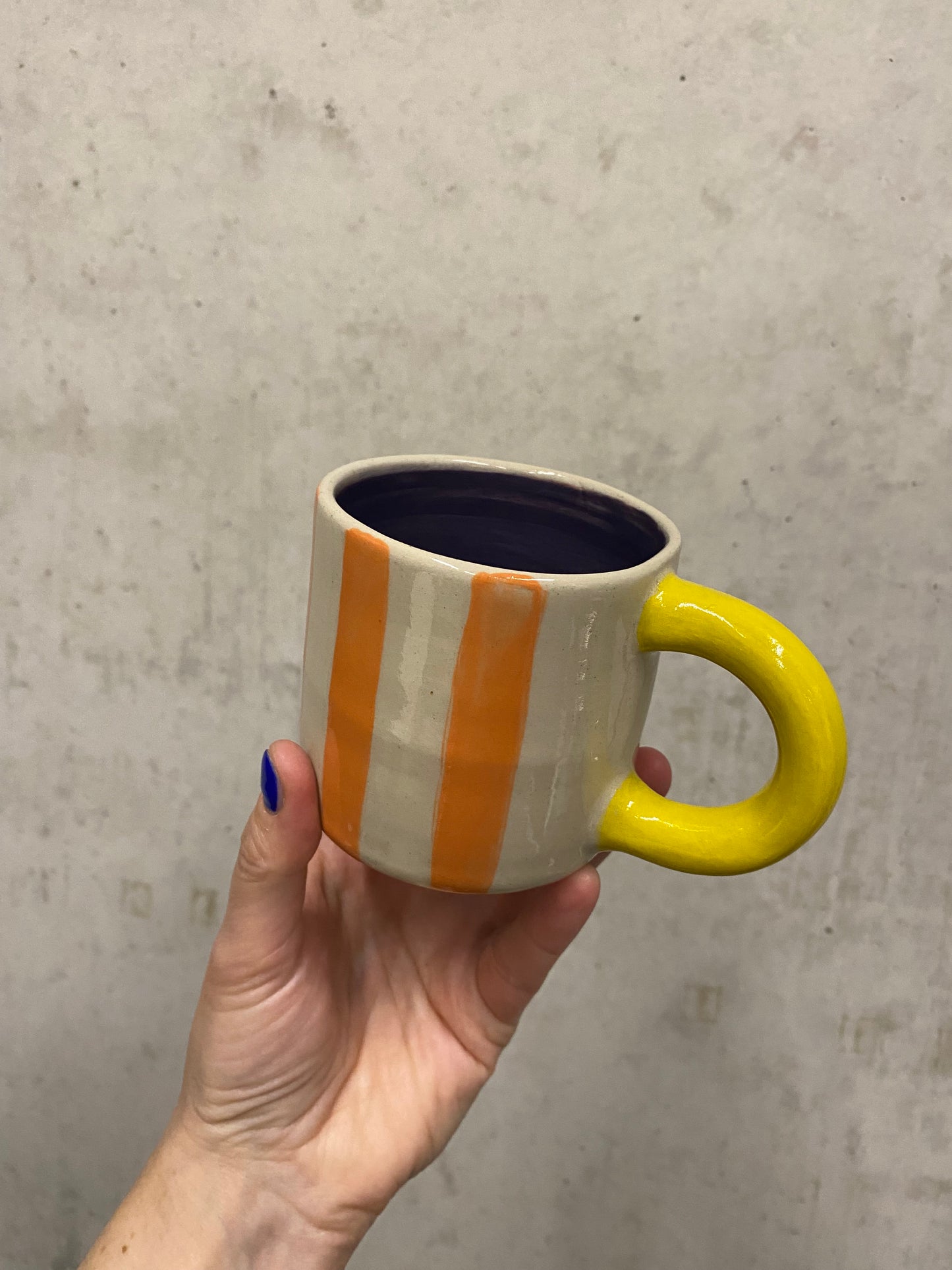 Keramiktasse "Gutti" in orange/ gelb / lila
